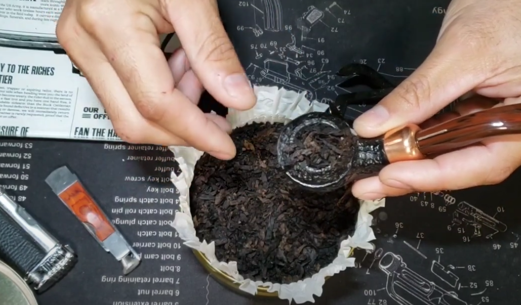 Wie man eine Pfeife raucht